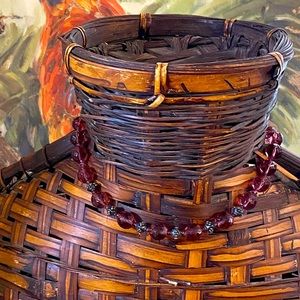 Hand made crystal rose tone necklace.